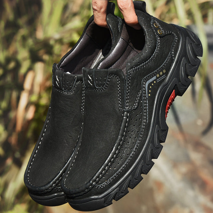 Women's orthopedic black leather boots with a smooth finish, offering maximum comfort