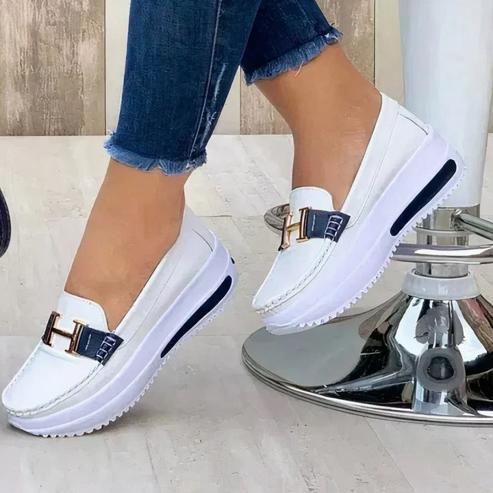 Comfortable women's platform slip-on loafers. Versatile modern footwear for casual or dressy outfits.