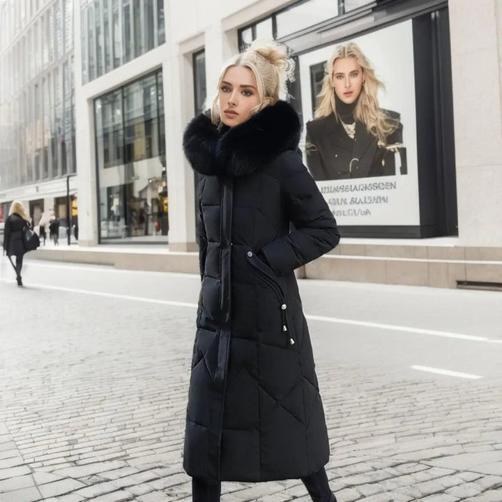 Women's warm and insulated black quilted winter coat featuring a comfortable hood