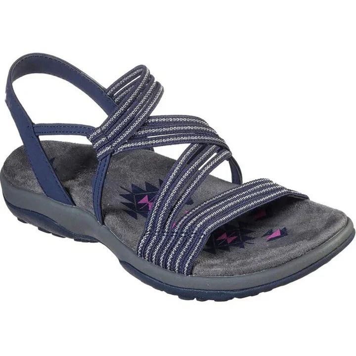 Stylish women's strappy flat sandals in brown, offering comfort for spring and summer outings