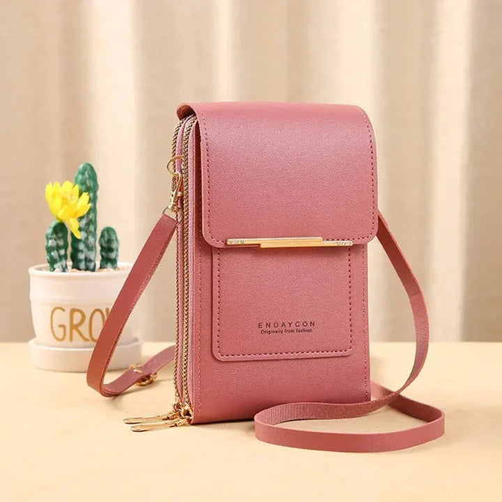 Stylish women's touch screen crossbody shoulder bag for smartphones, hands-free on the go.