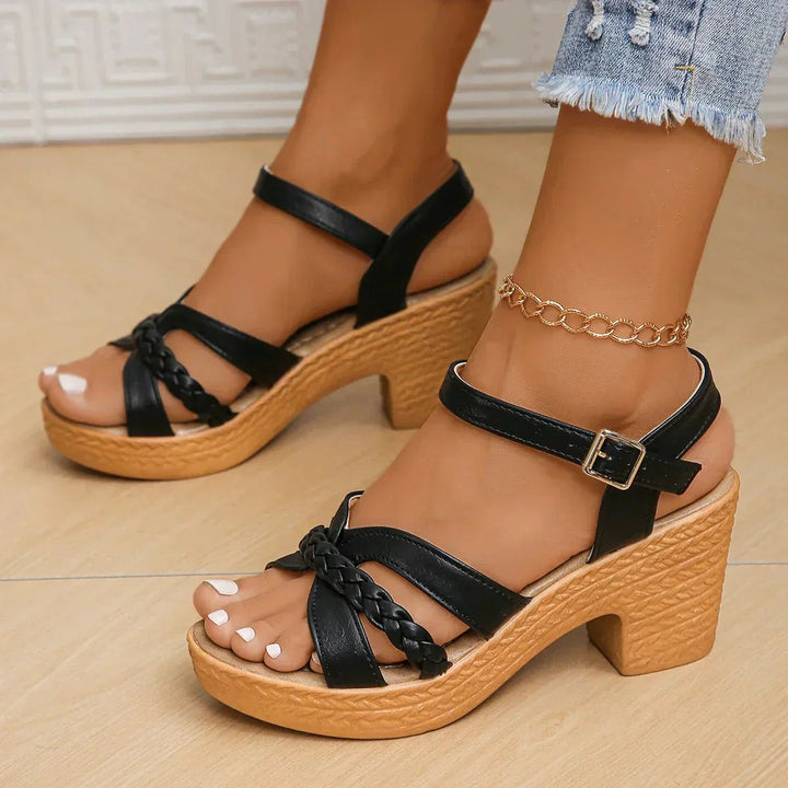 Fashionable women's braided block heel sandals with secure ankle strap, perfect for summer elegance.