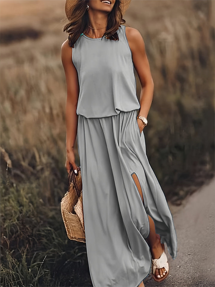 Full length women's blouson maxi dress with a flattering elastic waist. Effortless style.