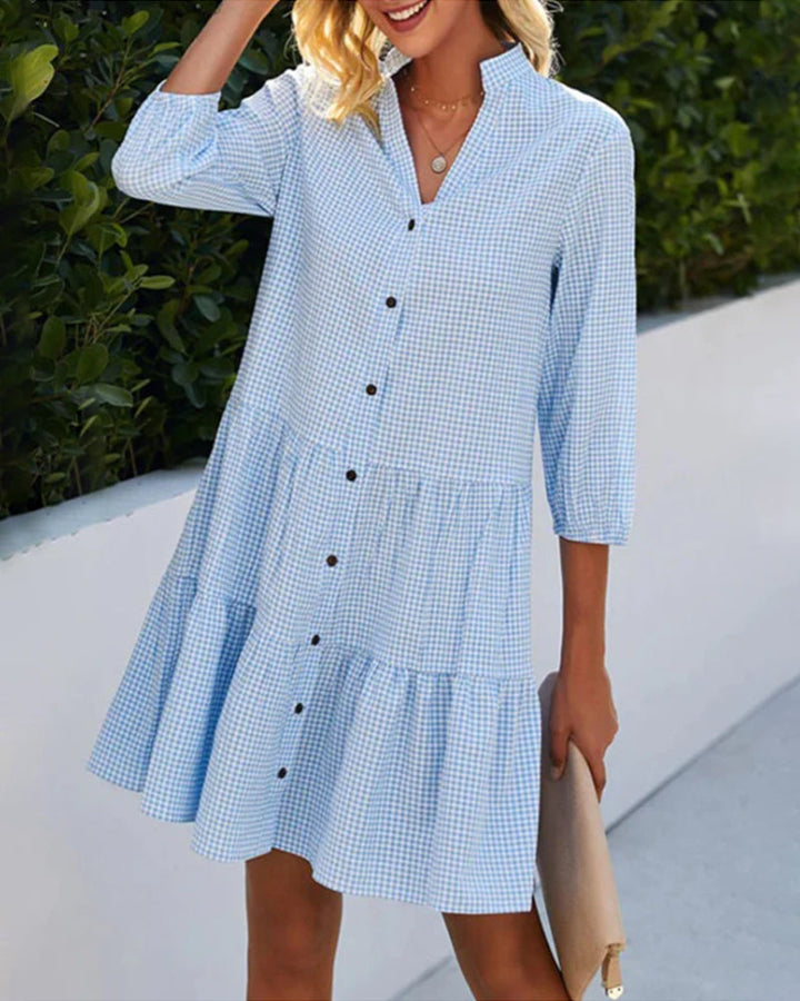 Women's blue check summer dress with short sleeves, tiered skirt. Perfect casual wear.