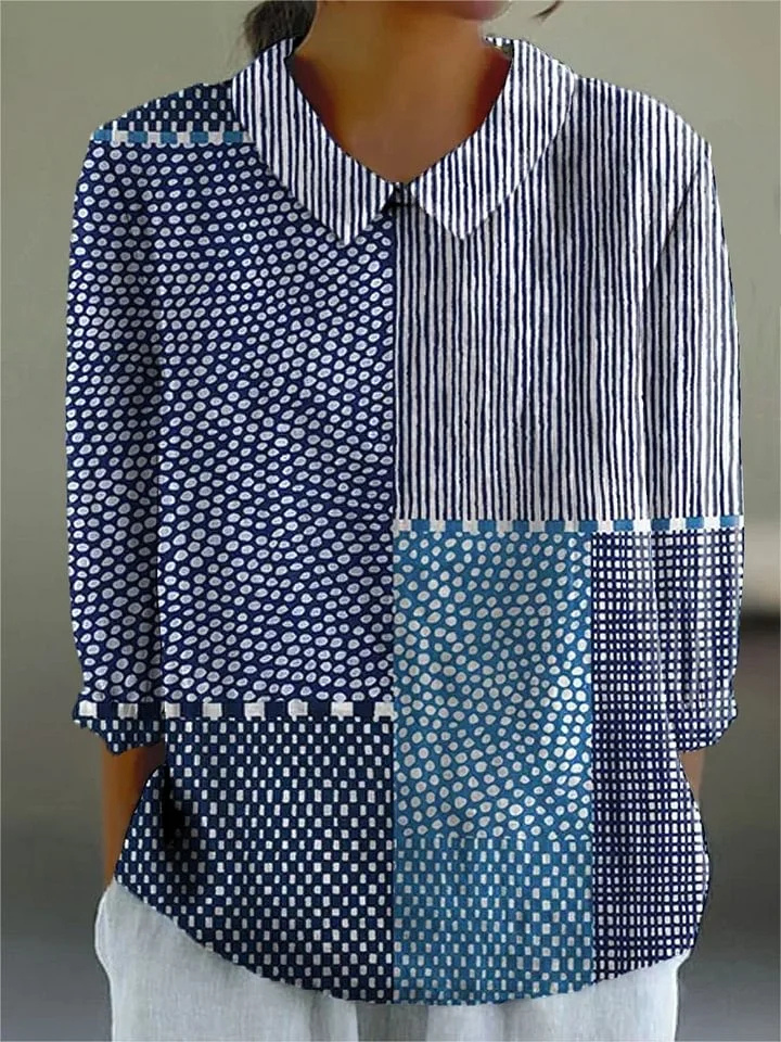 Women's blue patchwork print long-sleeve collared blouse, ideal for casual or smart-casual everyday wear.