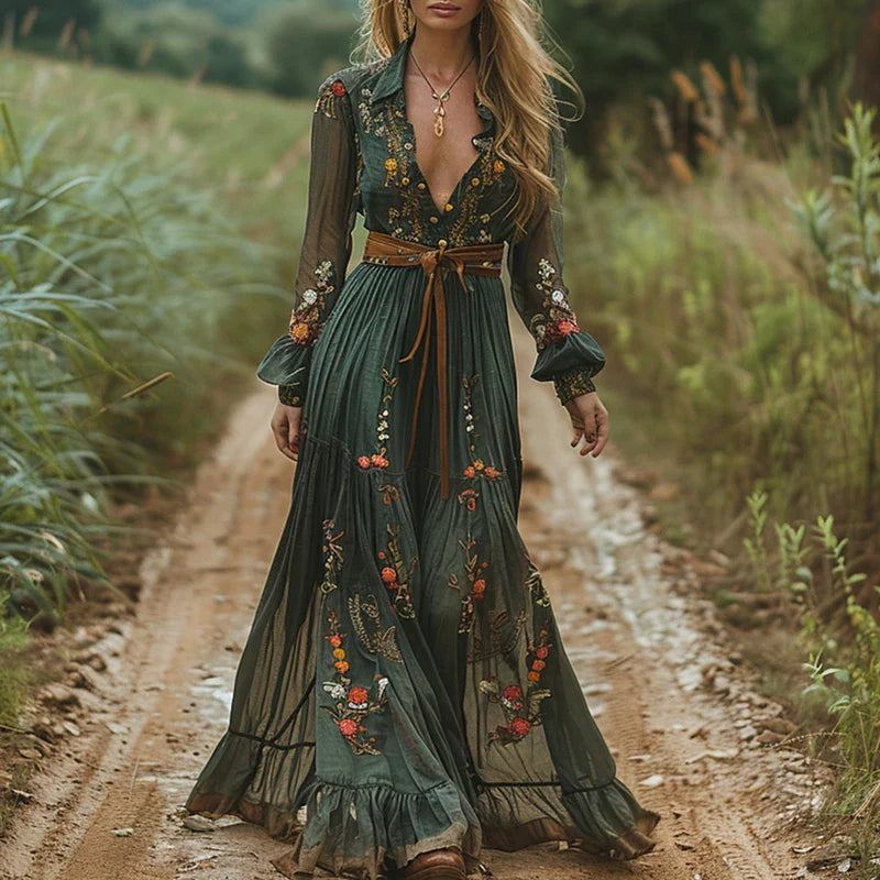Women's bohemian maxi dress with floral embroidery, v-neck, and flowy silhouette for summer elegance.