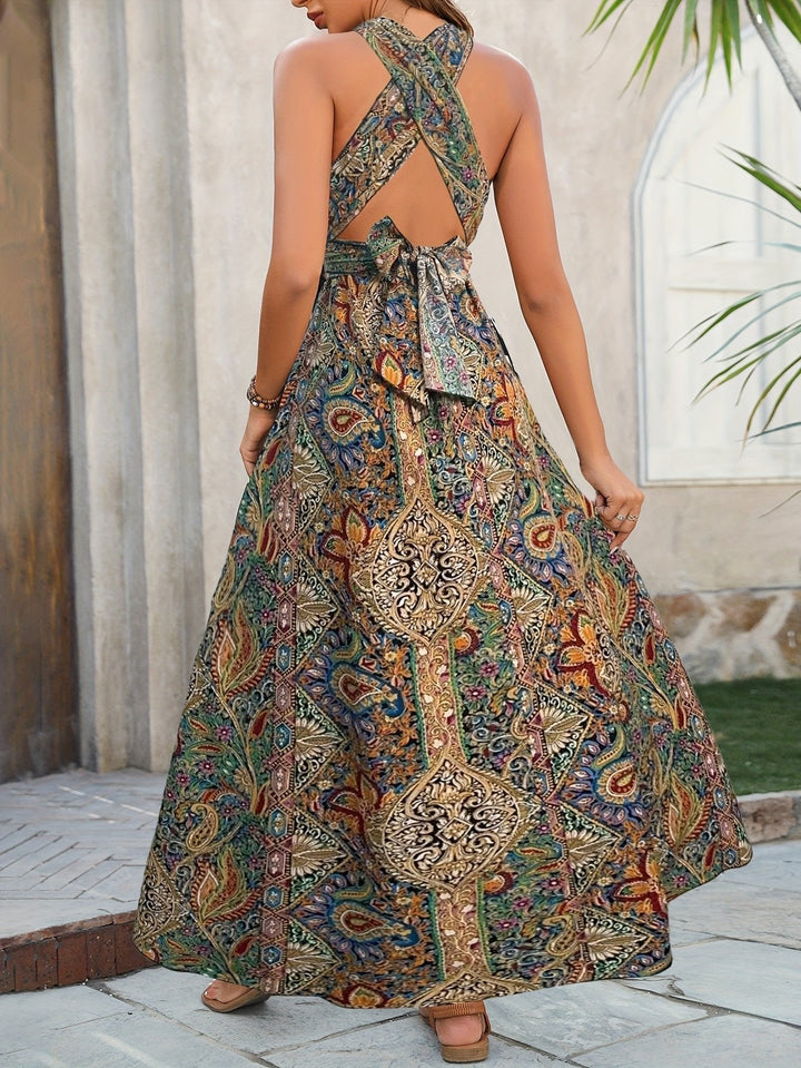 Women's long bohemian dress, halter neck design, flowy material, side split detail. Perfect for sunny days.
