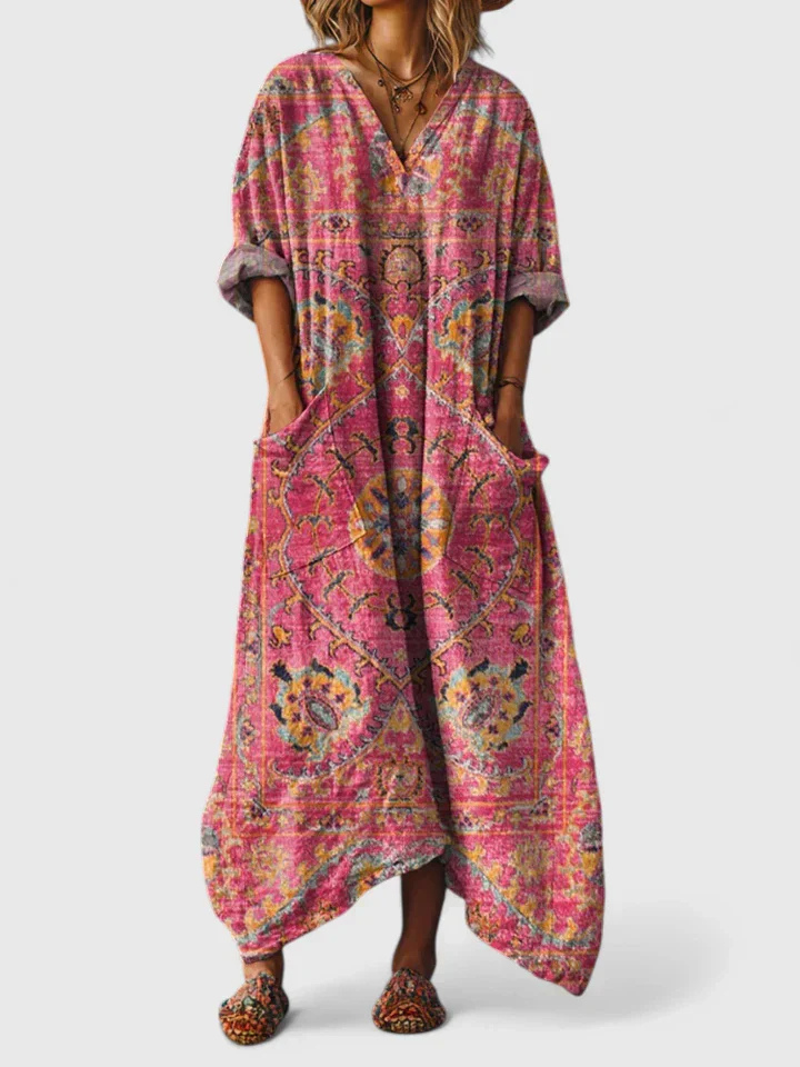 Casual summer bohemian print maxi dress for women. Features a flattering v-neck, 3/4 sleeves, and pockets.