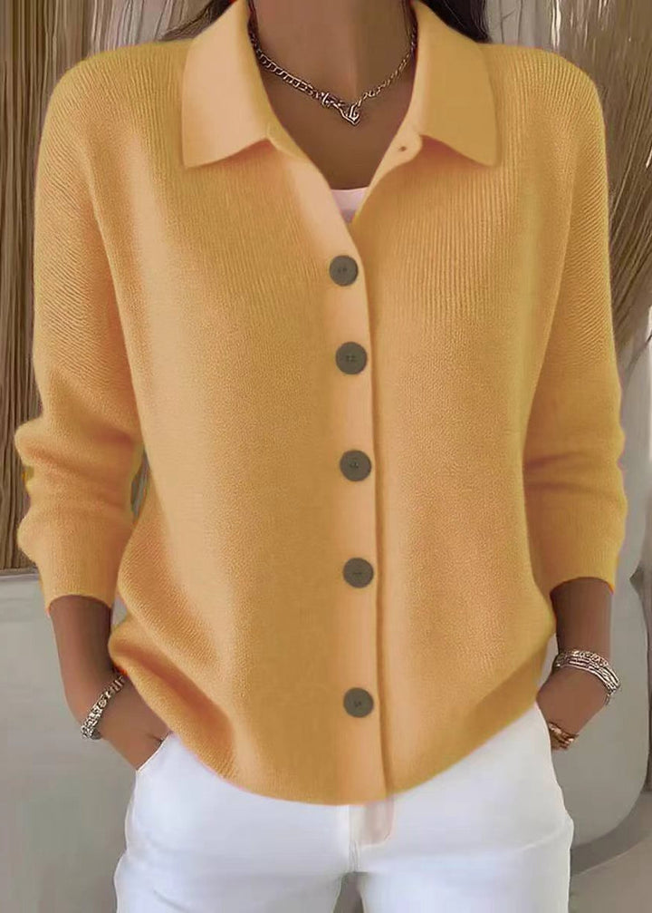 Women's button down cardigan, an essential transitional sweater with a sophisticated shirt collar.