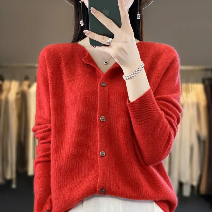 Fashionable women's button front knit cardigan. Cozy, long sleeve, round neck. Elegant fall & winter style.