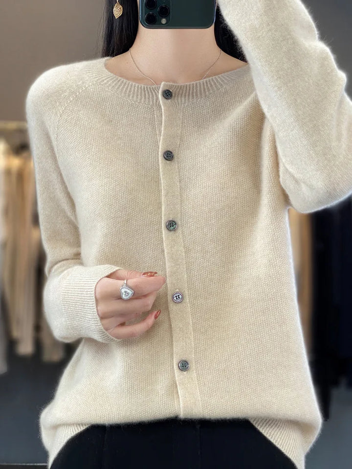 Versatile women's button front knit cardigan. Long sleeve, round neck. Casual chic for spring wardrobe.