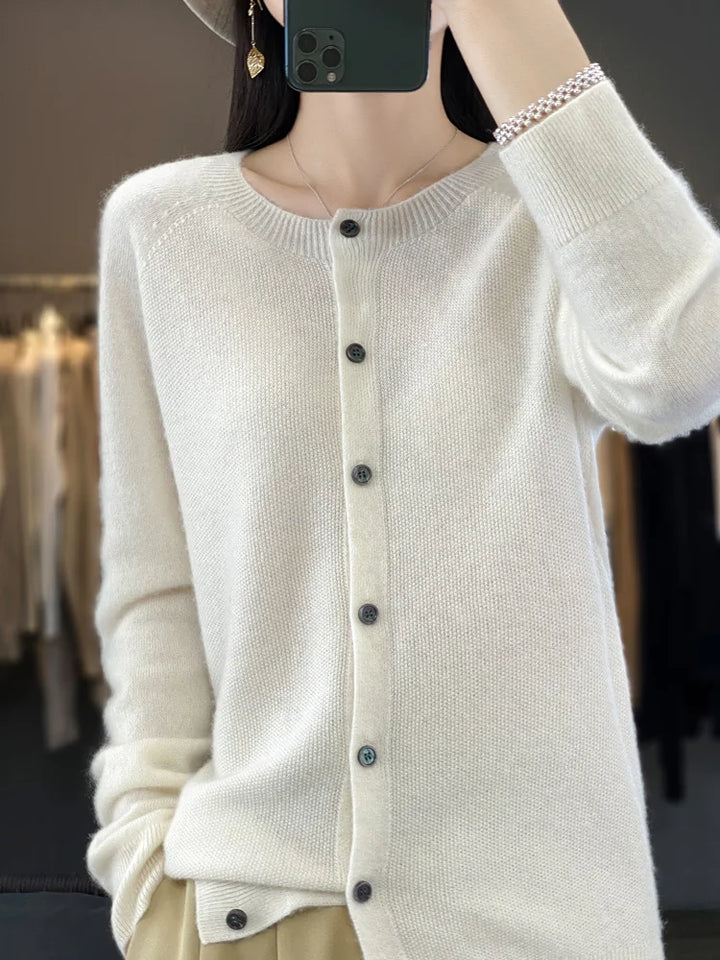 Soft & cozy women's knitwear cardigan, button front, long sleeve. Round neck layering top for comfort.