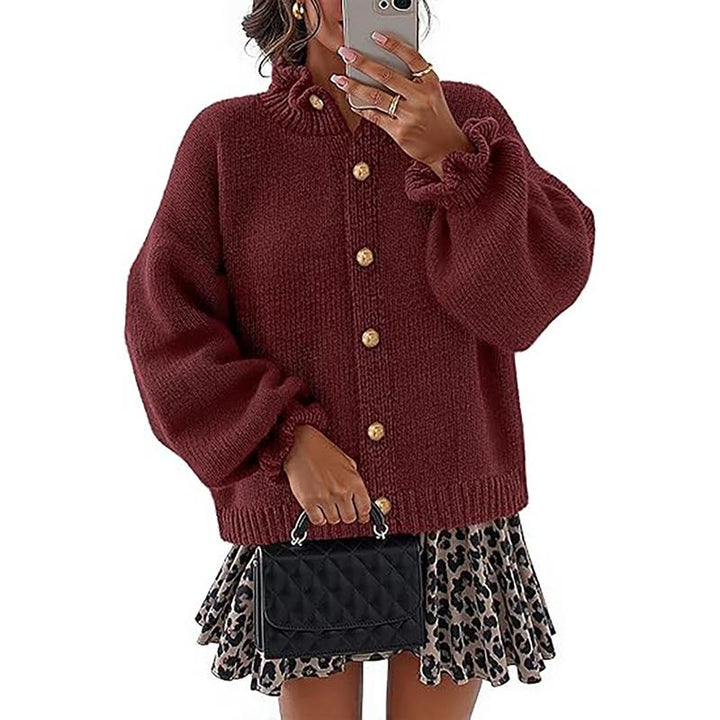 Cozy women's long sleeve knit cardigan sweater with buttons, ideal for a layered look.