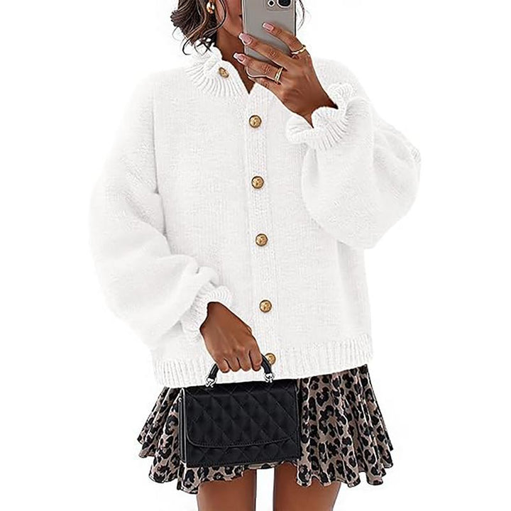 Long sleeve women's knit cardigan made from a wool blend, featuring a stylish button-front design.