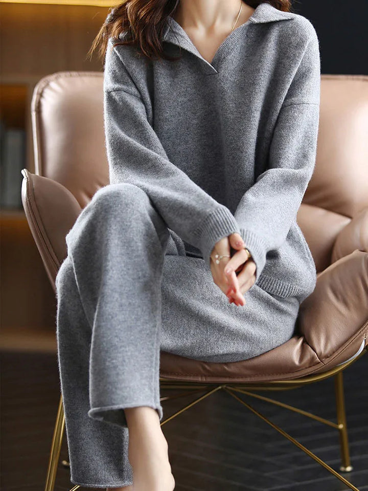 Close-up on the knit pattern of the women's polo top, a luxurious cashmere blend fabrication
