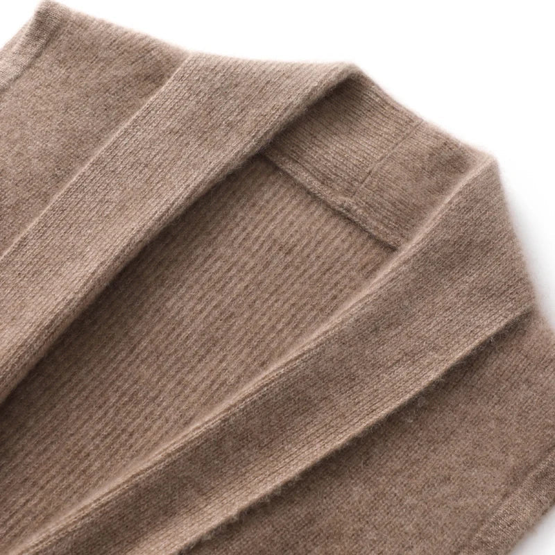 Vertical shot of a women's cashmere blend knit vest, belted, elegant appeal