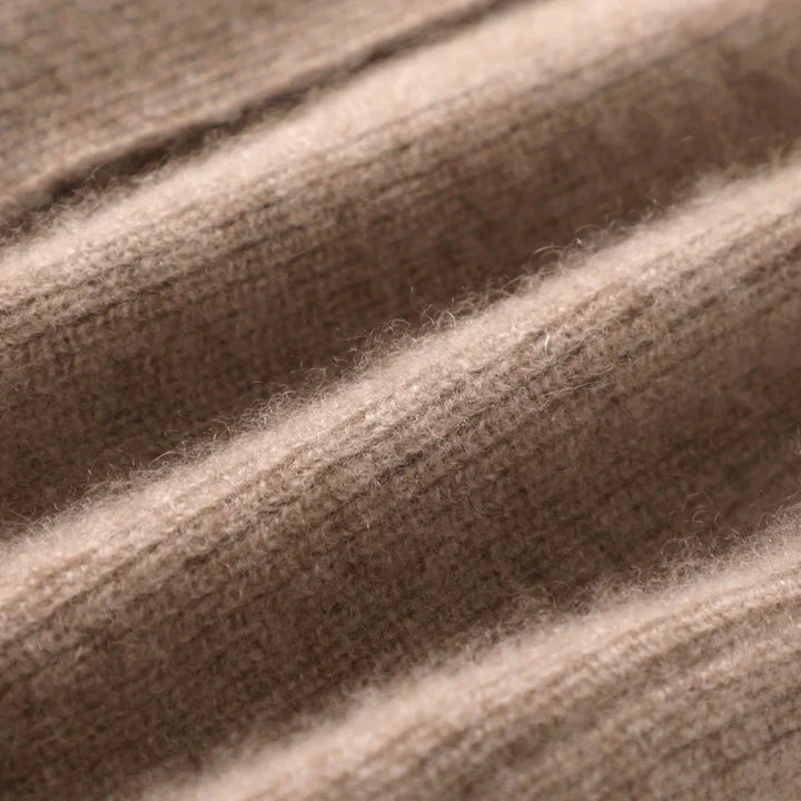 Studio shot of a women's cashmere blend knit vest, belted, on a mannequin