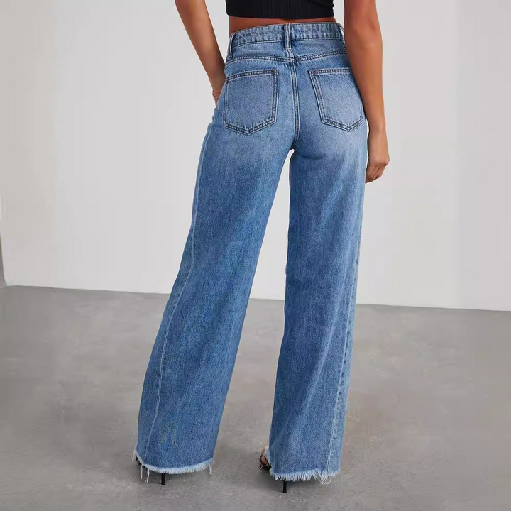 Comfortable women's blue wide-leg jeans with a high waist, made from durable denim for everyday fashion.