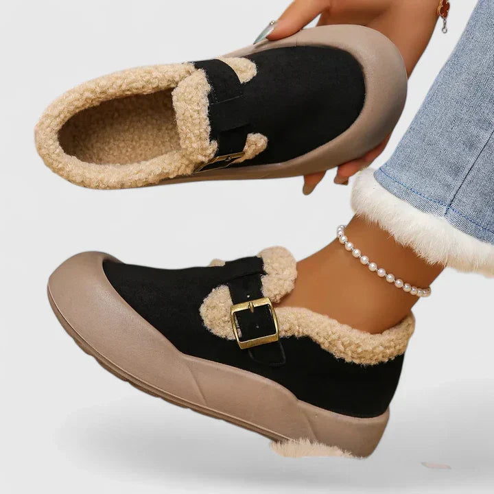 Comfortable women's buckle slip-on flats in a neutral tone, essential everyday shoes for women.