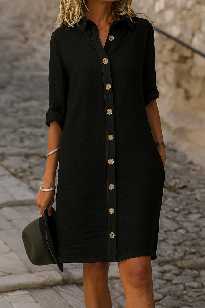 Women's casual collared shirt dress, knee-length, with roll tab sleeves & button front.