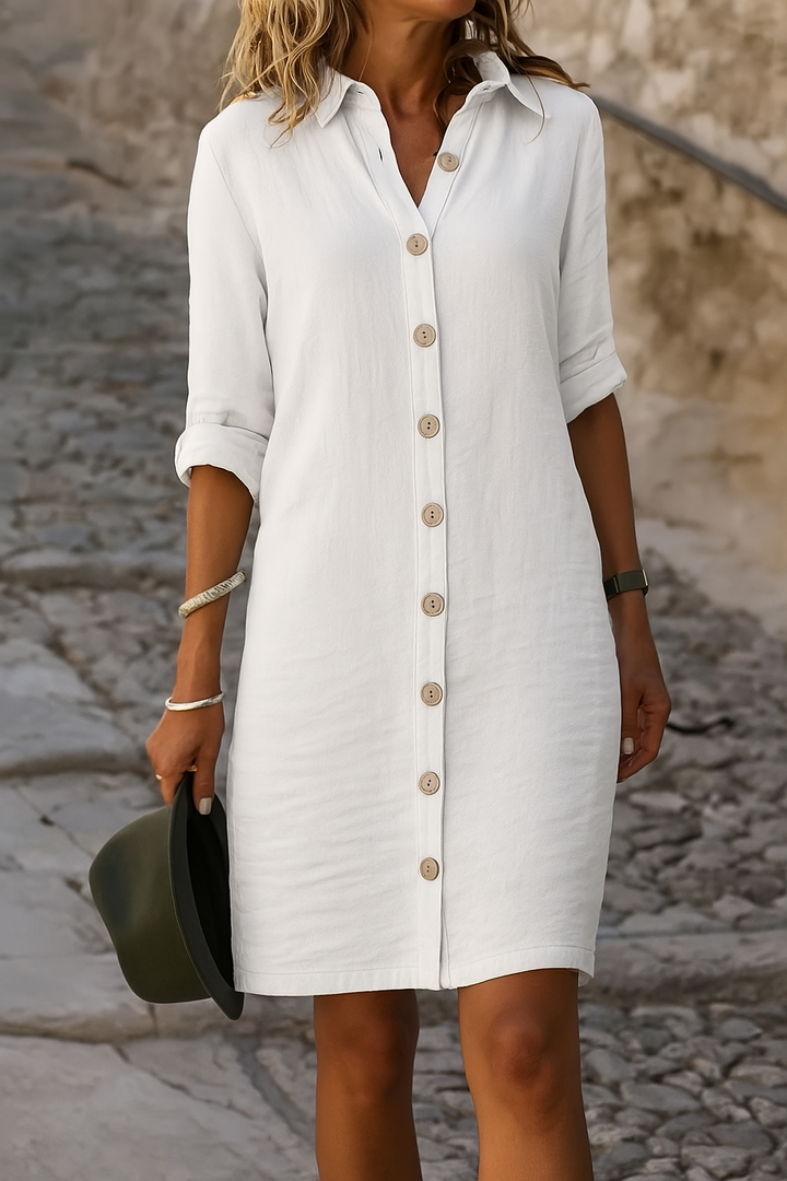 Comfortable women's casual dress, collared, roll tab sleeves, perfect for sunny days.