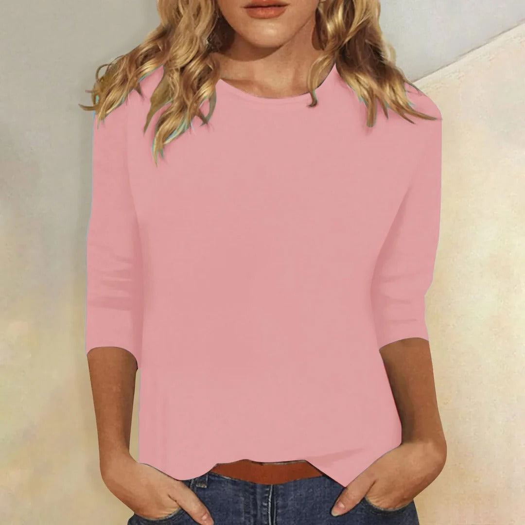 Women's casual crew neck top with relaxed fit and 3/4 sleeves, perfect for everyday comfort and style.