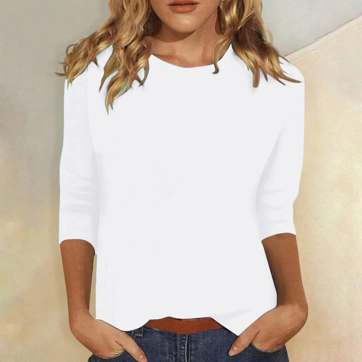 Comfortable women's relaxed fit 3/4 sleeve crew neck top, ideal for casual everyday wear and lounging.