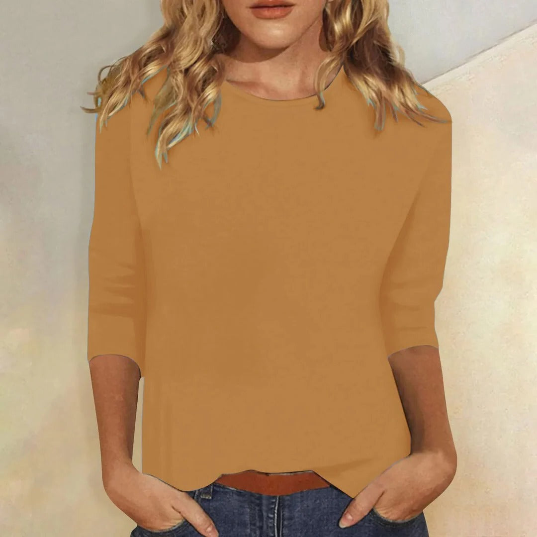 Essential women's relaxed fit 3/4 sleeve crew neck top, perfect basic for versatile casual and layering.