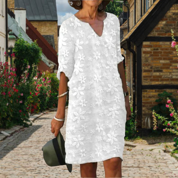 Women's casual floral V-neck midi dress, perfect for summer, featuring a comfortable fit and short sleeves.