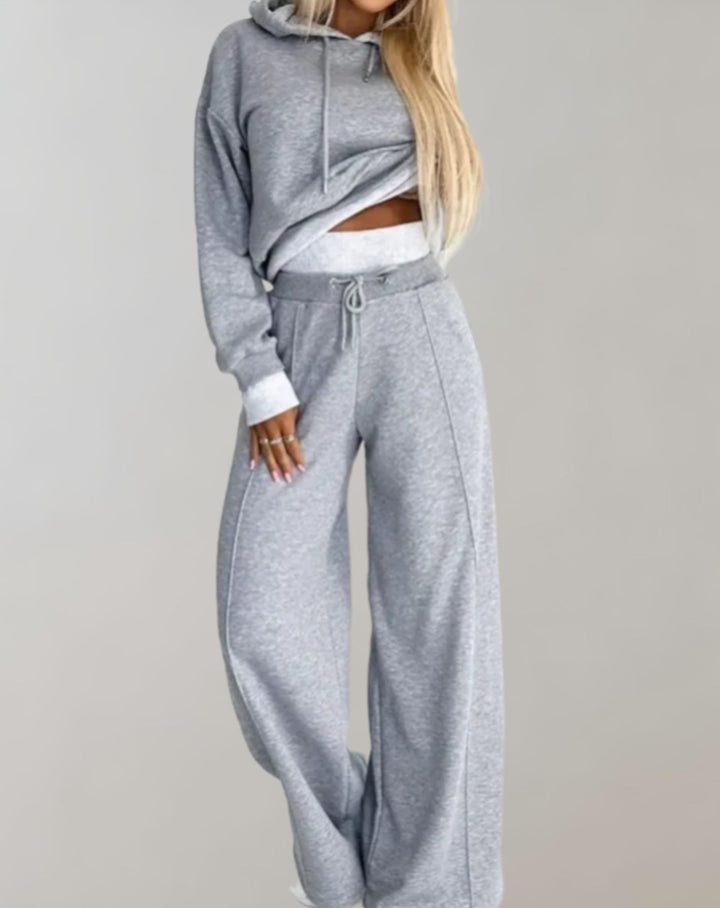 Cozy women's casual hoodie and tracksuit set in a soft fabric, ideal for loungewear or active styling.