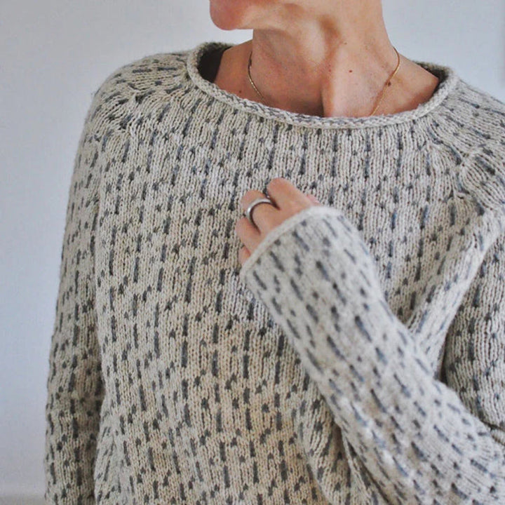 Stylish women's boat neck sweater, a comfortable knit top for relaxed everyday outfits.