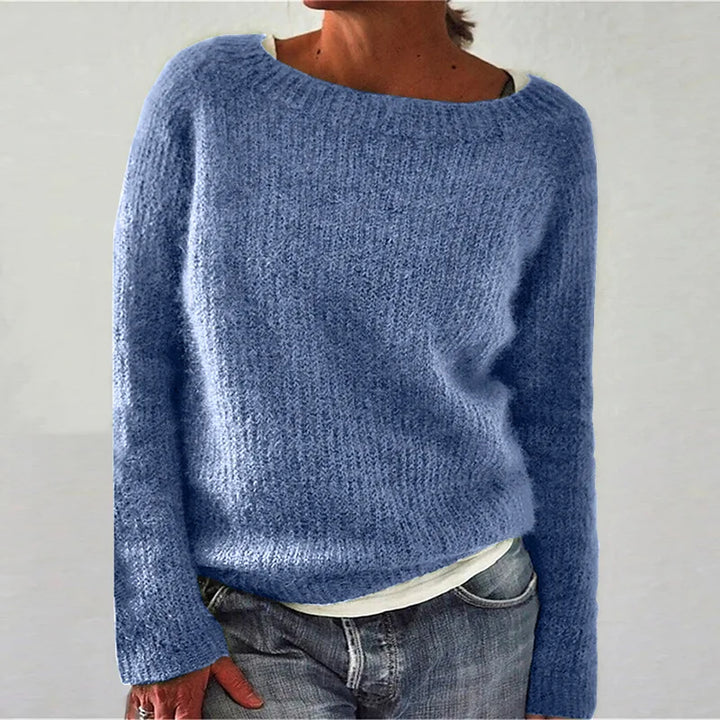Chic women's knit pullover sweater with a relaxed fit, ideal for versatile casual wear and winter