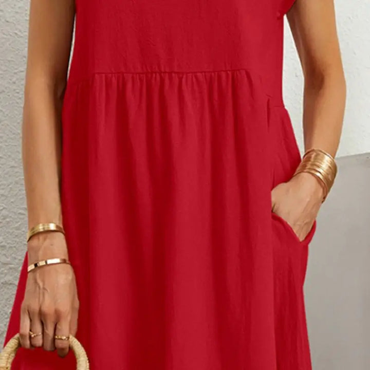 Stylish women's casual midi dress with short sleeves, round neck, and handy pockets for daily wear.