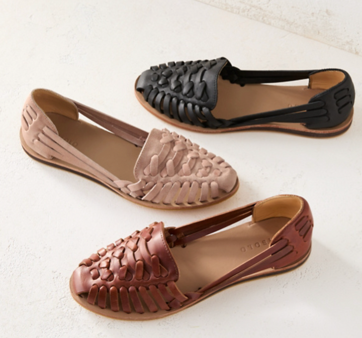 Pair of women's casual open-toe sandals in a neutral color, versatile for summer comfort