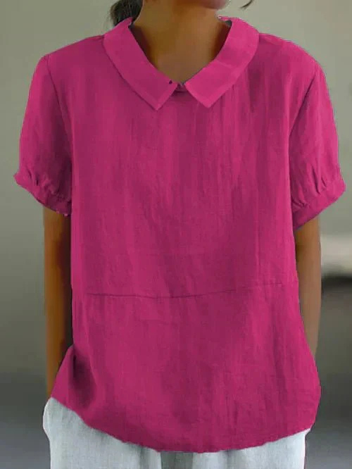 Versatile women's casual short sleeve top with Peter Pan collar. Chic, comfortable, everyday wear for spring/summer.
