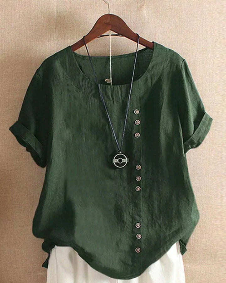 Soft fabric women's short sleeve blouse with full button placket, great for casual style.