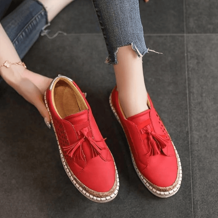 Women's flats designed as slip-on loafers, offering comfort for everyday casual footwear.