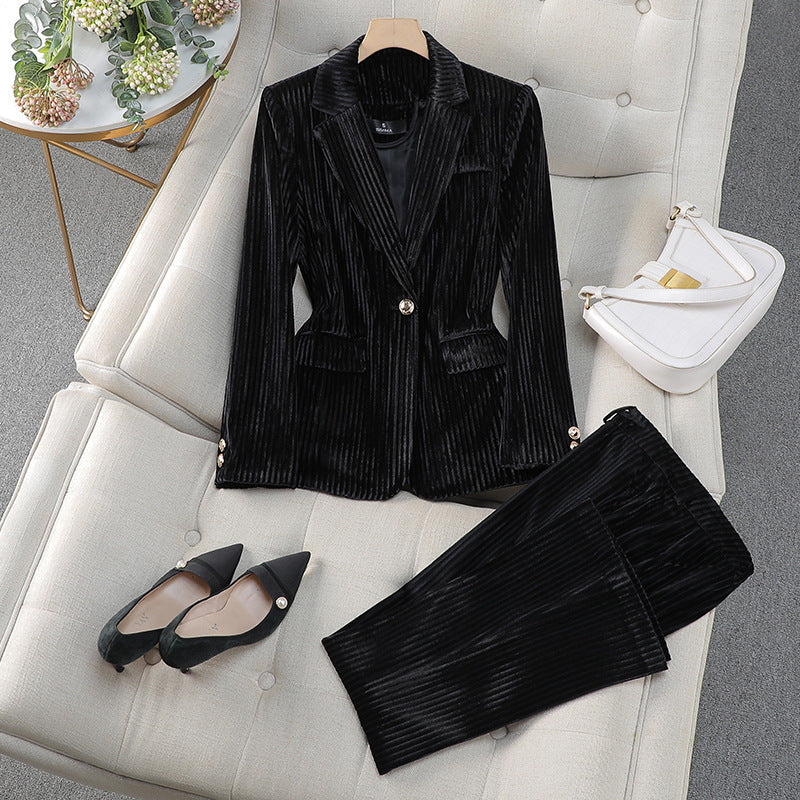 Women's long blazer and matching tailored pants, a versatile and elegant attire for various occasions.