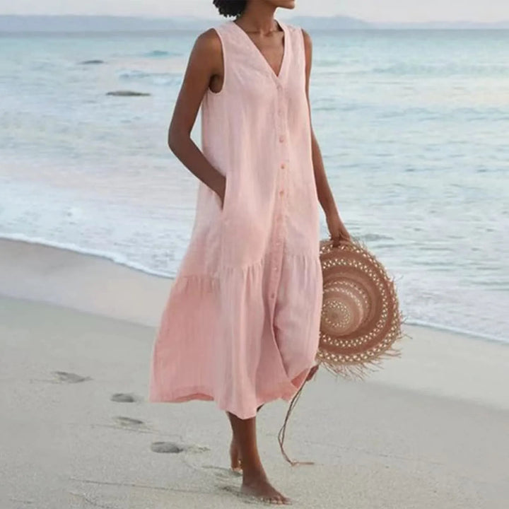 Versatile women's midi summer dress, V-neck, sleeveless, button-front, with practical pockets.