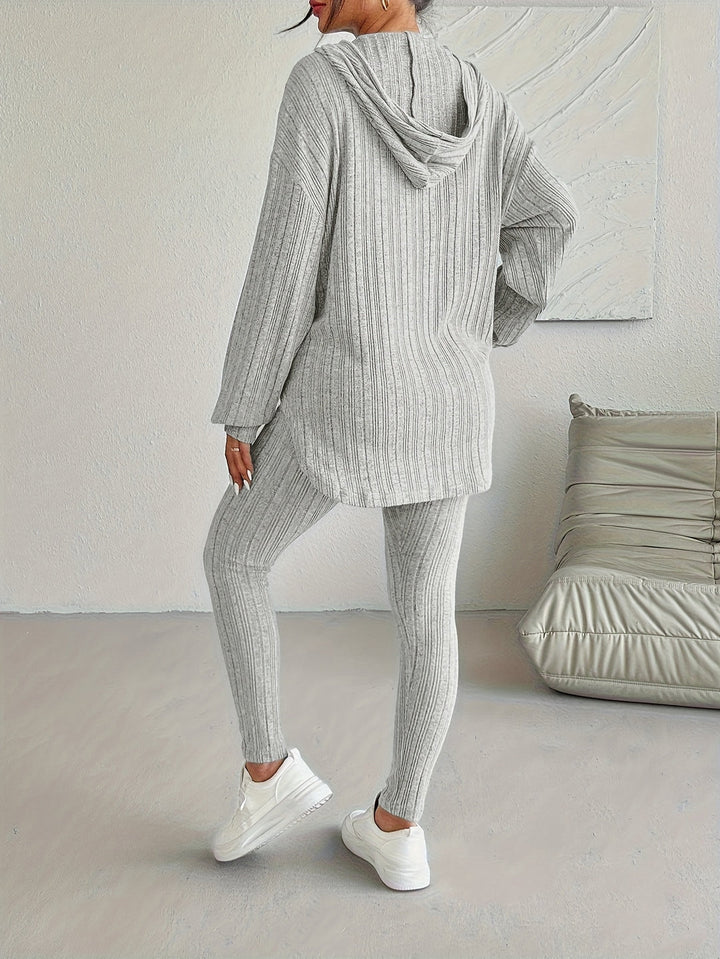 Full length image of a woman in a comfortable ribbed knit loungewear set, perfect for activewear