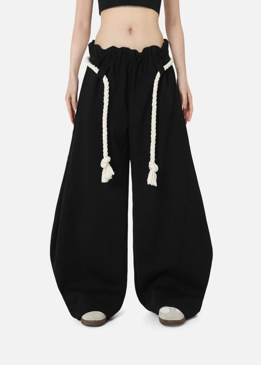 Comfortable women's lounge wear: baggy barrel leg sweatpants with an adjustable high waist for relaxed styling.