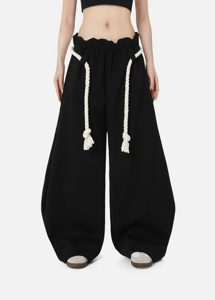 Comfortable women's lounge wear: baggy barrel leg sweatpants with an adjustable high waist for relaxed styling.