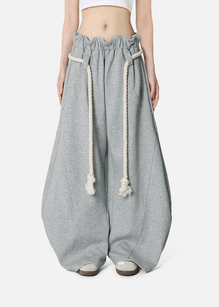 Baggy barrel leg sweatpants for women, offering a comfortable wide leg fit and adjustable high waist for daily wear.