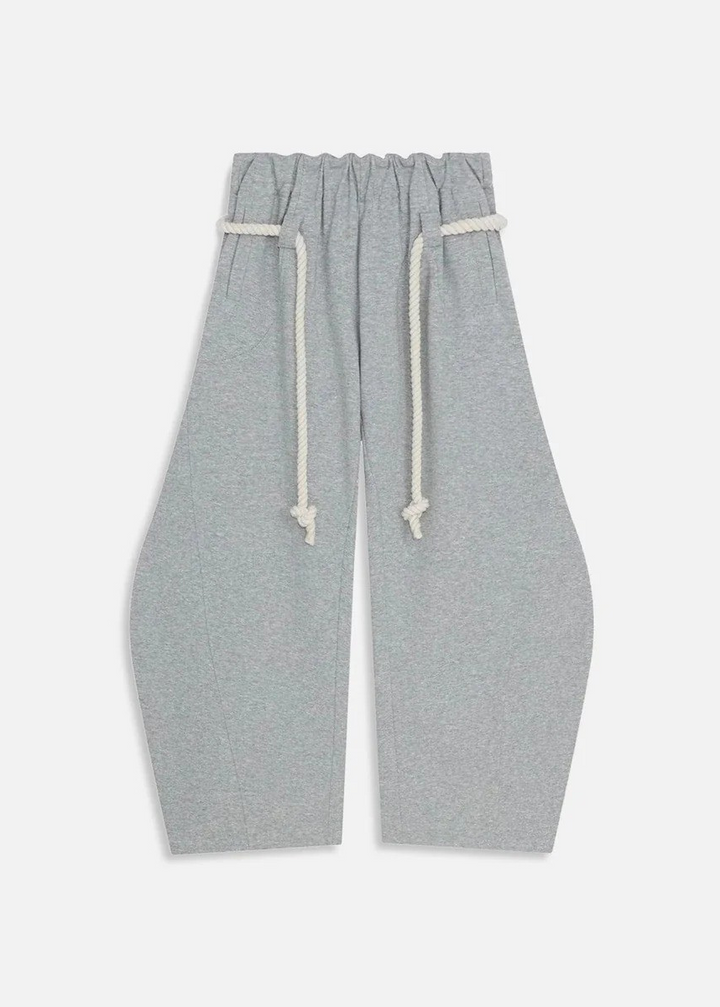 Women's casual barrel leg trousers, perfect for street style, featuring a relaxed wide leg and adjustable waist.