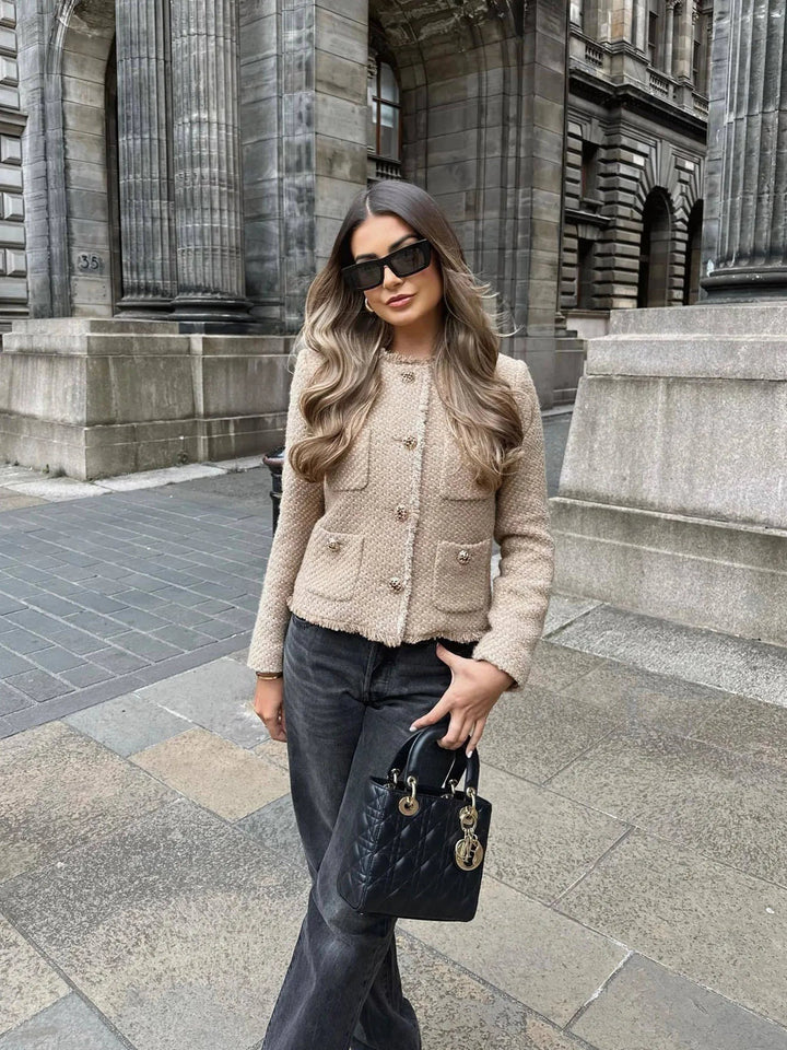 Women's cropped tweed blazer, combining classic style with modern sensibility for a chic silhouette