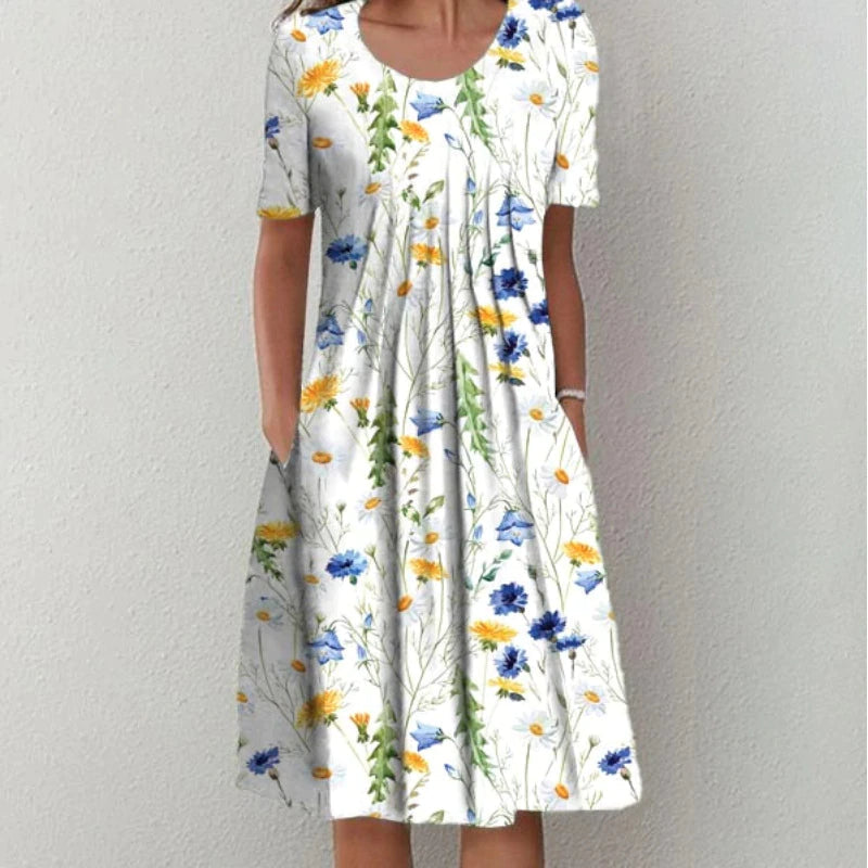 Elegant floral print midi dress for women, featuring a comfortable fit and practical pockets.