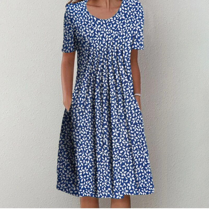 Effortless women's midi dress, floral pattern, short sleeves, and round neck for daily wear.