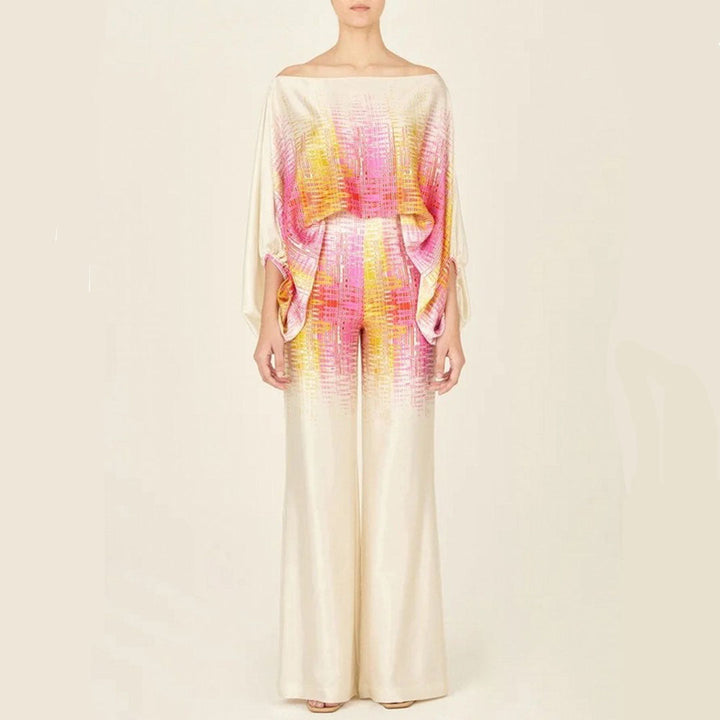 High-waisted shorts and off-shoulder top make up this chic women's two-piece summer printed set.
