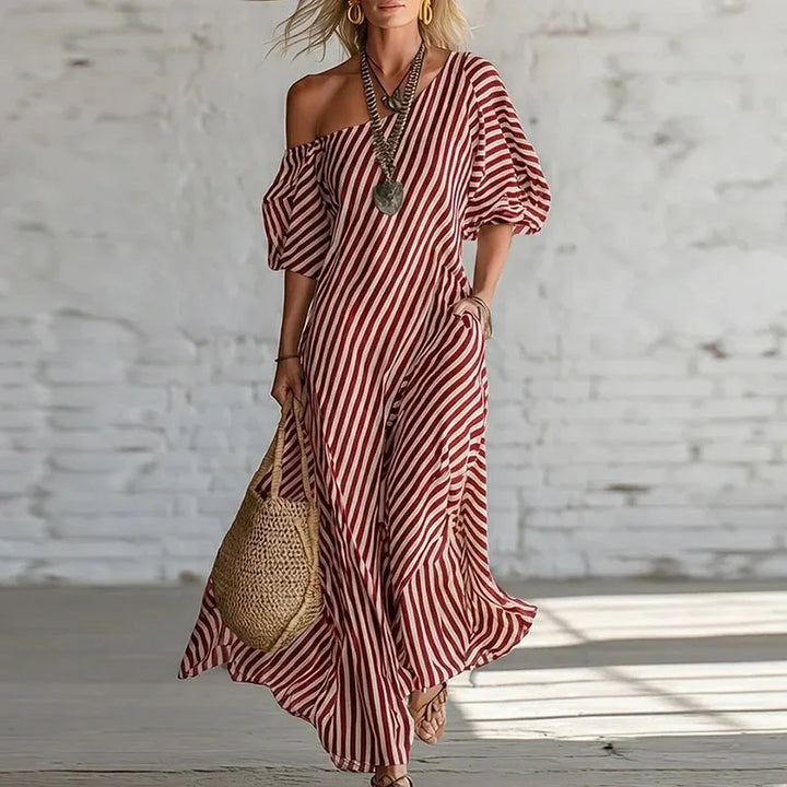Flowy one-shoulder party dress for women with a trendy puff sleeve and chic striped pattern.