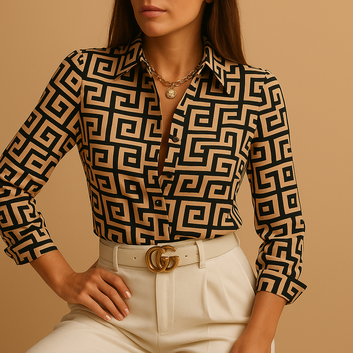 Women's chic printed blouse, showcasing flattering design & versatile style. A fashionable long sleeve everyday top.